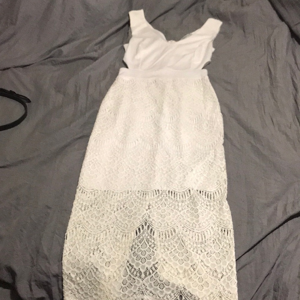 White dress with side cutouts and lace skirt